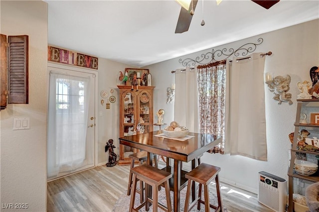 700 Capri Dr Unit 27B, Boulder City, NV 89005 - dining room featuring a ceiling fan and light wood-style flooring