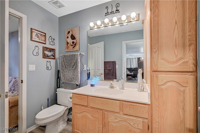 700 Capri Dr Unit 27B, Boulder City, NV 89005 - ensuite bathroom with vanity and toilet