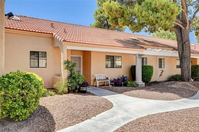 2851 S Valley View Blvd Unit 1039, Las Vegas, NV 89102 - view of front of house featuring a tile roof and stucco siding