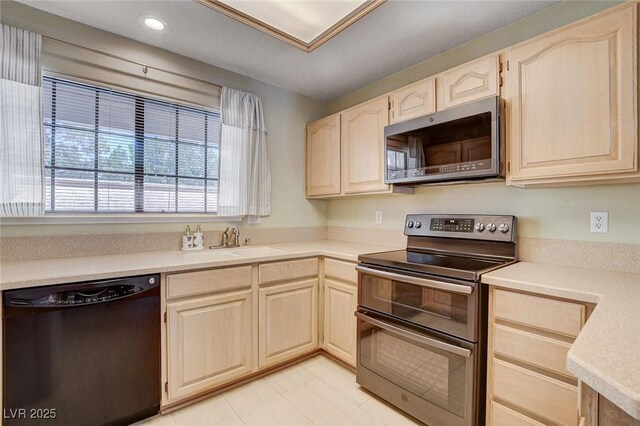 2851 S Valley View Blvd Unit 1039, Las Vegas, NV 89102 - kitchen featuring appliances with stainless steel finishes, light brown cabinets, light countertops, and recessed lighting