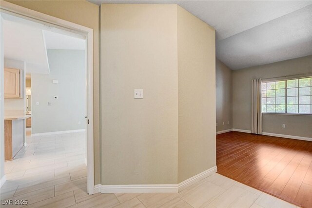 2851 S Valley View Blvd Unit 1039, Las Vegas, NV 89102 - unfurnished room with baseboards and light wood finished floors