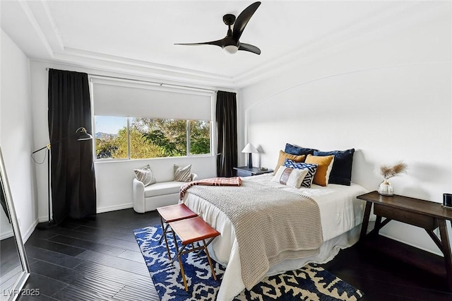 9430 Laguna Niguel Dr Unit 203, Las Vegas, NV 89134 - bedroom featuring hardwood / wood-style floors, a tray ceiling, and a ceiling fan