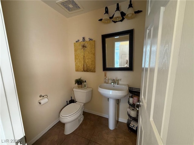 1146 Olivia Pkwy, Henderson, NV 89011 - half bathroom featuring toilet and tile patterned flooring