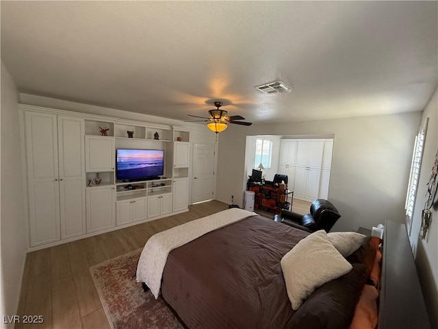 1146 Olivia Pkwy, Henderson, NV 89011 - bedroom with wood finished floors and a ceiling fan