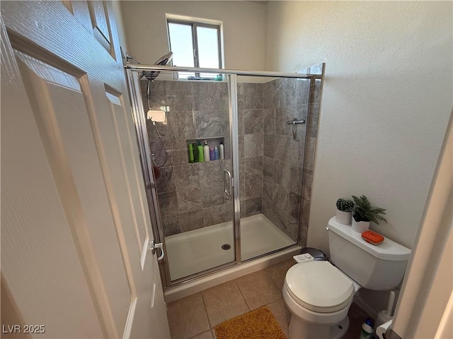 1146 Olivia Pkwy, Henderson, NV 89011 - bathroom featuring a stall shower and tile patterned floors