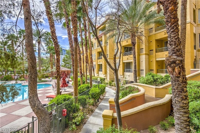 220 E Flamingo Rd Unit 317, Las Vegas, NV 89169 - view of property's community with a pool