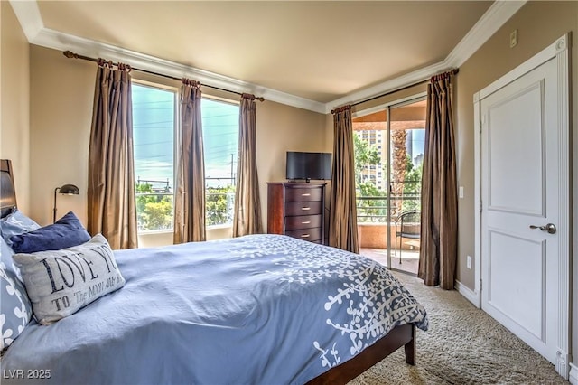 220 E Flamingo Rd Unit 317, Las Vegas, NV 89169 - bedroom featuring crown molding, access to outside, and carpet floors
