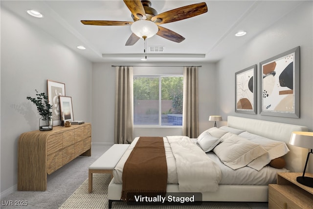 9784 Kodiak Island Ct, Las Vegas, NV 89141 - carpeted bedroom featuring a raised ceiling, recessed lighting, and ceiling fan