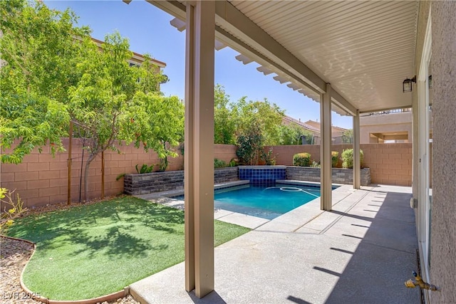 9784 Kodiak Island Ct, Las Vegas, NV 89141 - view of swimming pool with a fenced backyard and a patio area