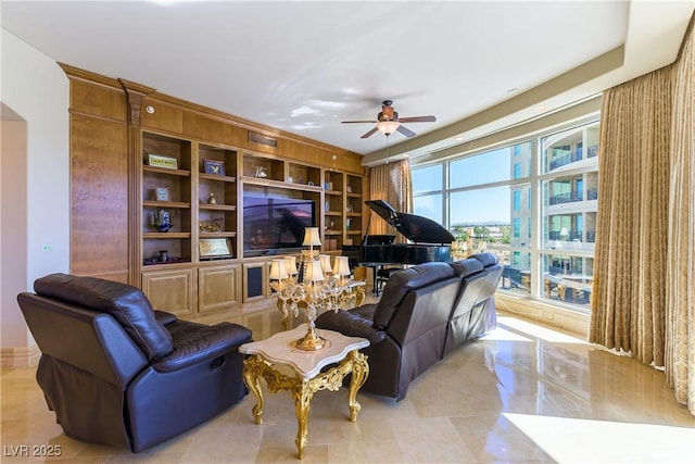 9101 Alta Dr Unit 301, Las Vegas, NV 89145 - living room featuring ceiling fan and arched walkways
