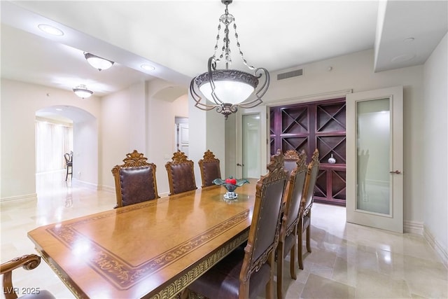 9101 Alta Dr Unit 301, Las Vegas, NV 89145 - dining area with arched walkways and recessed lighting
