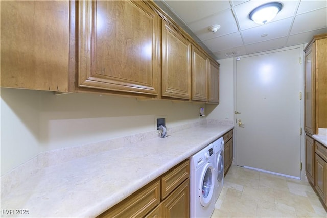 9101 Alta Dr Unit 301, Las Vegas, NV 89145 - laundry room featuring washer / clothes dryer and cabinet space