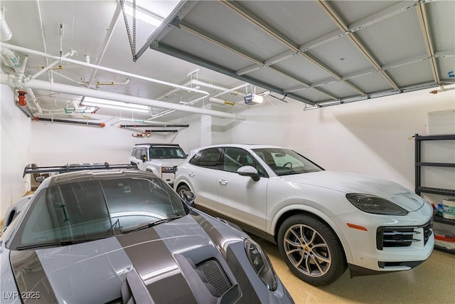 9101 Alta Dr Unit 301, Las Vegas, NV 89145 - garage featuring a garage door opener