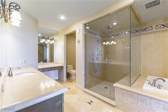 9101 Alta Dr Unit 301, Las Vegas, NV 89145 - bathroom featuring vanity, a stall shower, a garden tub, a chandelier, and recessed lighting