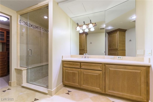 9101 Alta Dr Unit 301, Las Vegas, NV 89145 - bathroom featuring a stall shower, vanity, and recessed lighting