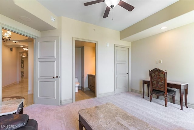 9101 Alta Dr Unit 301, Las Vegas, NV 89145 - bedroom with arched walkways, light carpet, connected bathroom, and a ceiling fan