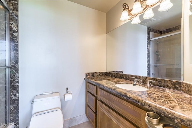 9101 Alta Dr Unit 301, Las Vegas, NV 89145 - bathroom with vanity, a shower stall, a chandelier, and tile patterned flooring