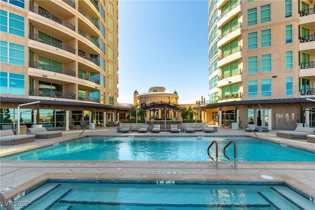 9101 Alta Dr Unit 301, Las Vegas, NV 89145 - community pool with a patio area