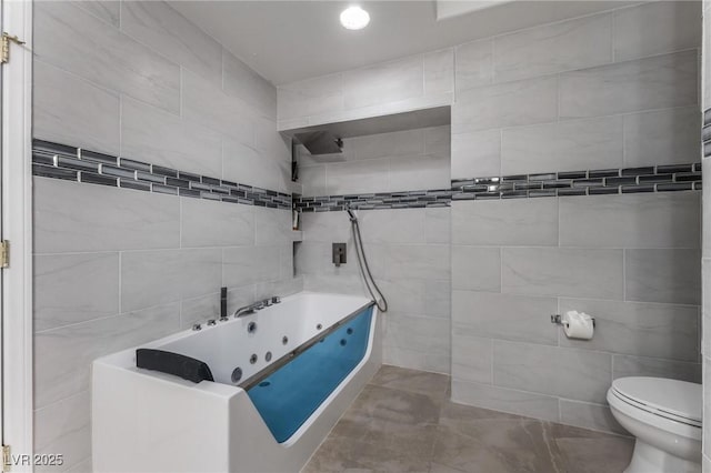 7720 W Agate Ave, Las Vegas, NV 89113 - bathroom with tile walls, a jetted tub, and pet washing station