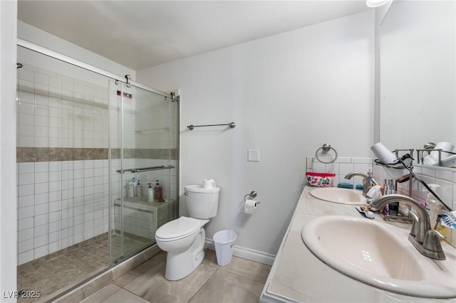 7720 W Agate Ave, Las Vegas, NV 89113 - full bathroom with tile patterned floors, a shower stall, and double vanity