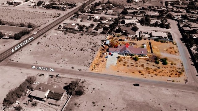 7720 W Agate Ave, Las Vegas, NV 89113 - aerial view of property's location featuring a desert landscape and nearby suburban area