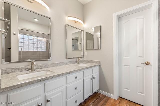 251 Big Horn Dr, Boulder City, NV 89005 - bathroom with double vanity and wood finished floors