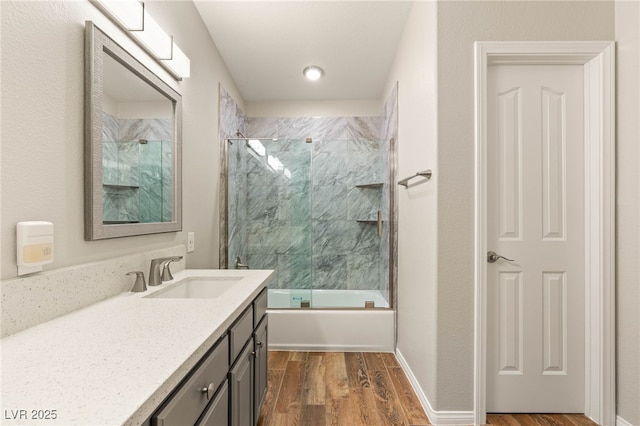 251 Big Horn Dr, Boulder City, NV 89005 - full bathroom featuring vanity, wood finished floors, and enclosed tub / shower combo