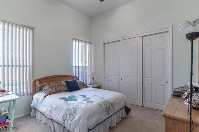 1239 N Hollywood Blvd, Las Vegas, NV 89110 - bedroom featuring light carpet and a closet