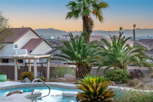 1239 N Hollywood Blvd, Las Vegas, NV 89110 - view of swimming pool with a pergola and a mountain view