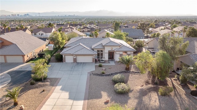 1239 N Hollywood Blvd, Las Vegas, NV 89110 - aerial perspective of suburban area featuring a mountainous background