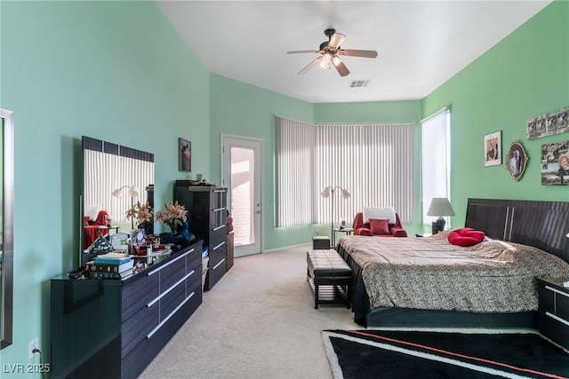 1239 N Hollywood Blvd, Las Vegas, NV 89110 - bedroom featuring carpet floors, access to exterior, and a ceiling fan