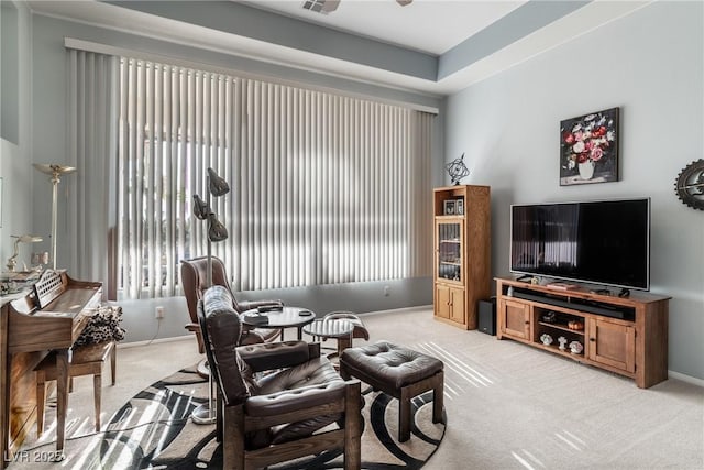 1239 N Hollywood Blvd, Las Vegas, NV 89110 - living room featuring light colored carpet and a ceiling fan