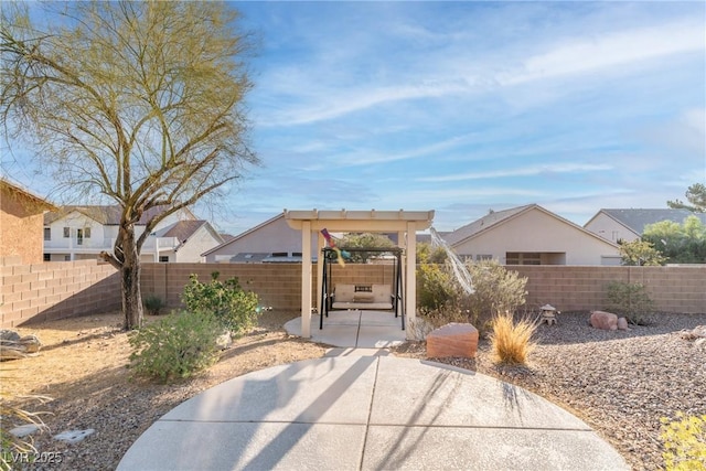 1239 N Hollywood Blvd, Las Vegas, NV 89110 - fenced backyard featuring a patio area and a residential view