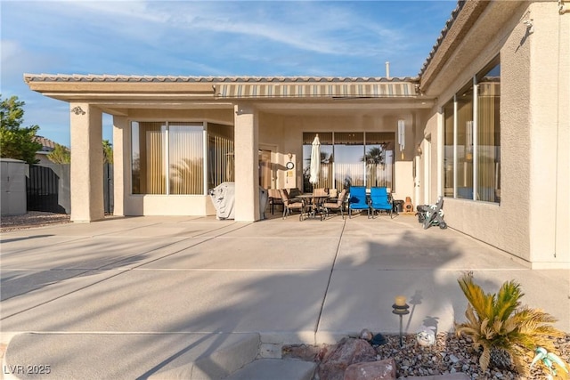 1239 N Hollywood Blvd, Las Vegas, NV 89110 - back of property featuring a patio area and stucco siding