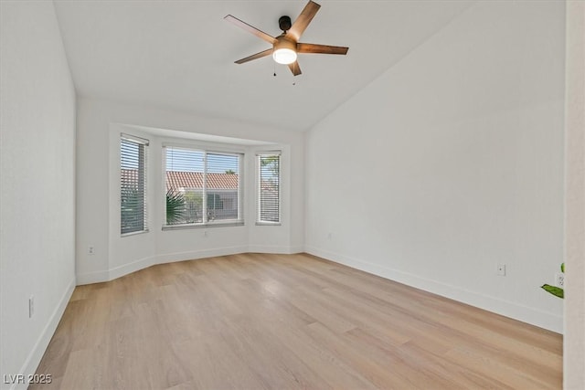 8924 Signal Terrace Dr, Las Vegas, NV 89134 - unfurnished room with light wood finished floors, ceiling fan, and lofted ceiling