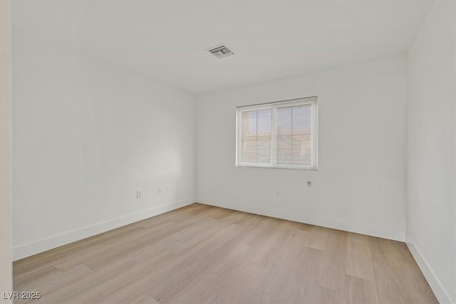 8924 Signal Terrace Dr, Las Vegas, NV 89134 - spare room featuring light wood-style flooring and baseboards