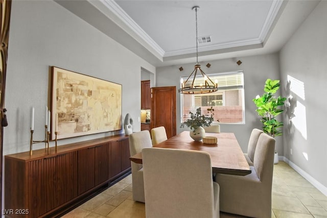 8209 Chapelle Ct, Las Vegas, NV 89131 - dining area with a tray ceiling, light tile patterned floors, a chandelier, and ornamental molding