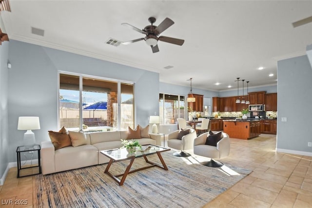 8209 Chapelle Ct, Las Vegas, NV 89131 - living room featuring crown molding, ceiling fan, and recessed lighting