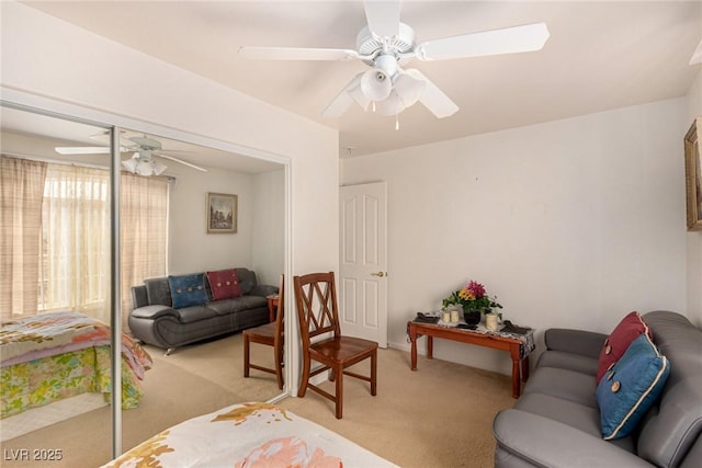 6781 Southgate St, Pahrump, NV 89061 - living room featuring light carpet and a ceiling fan
