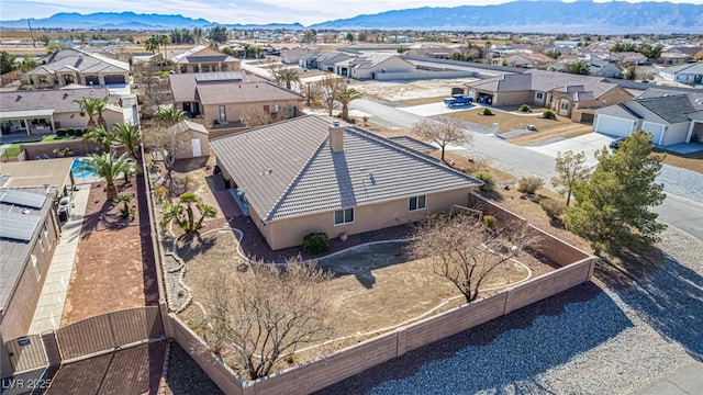 6781 Southgate St, Pahrump, NV 89061 - aerial perspective of suburban area featuring a mountain backdrop