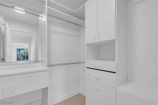 5264 Silverheart Ave, Las Vegas, NV 89142 - spacious closet featuring light wood-style floors