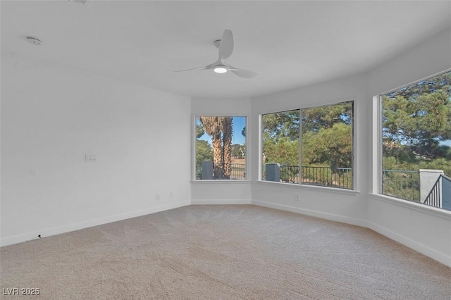 5264 Silverheart Ave, Las Vegas, NV 89142 - unfurnished room with a ceiling fan, light carpet, and a smoke detector