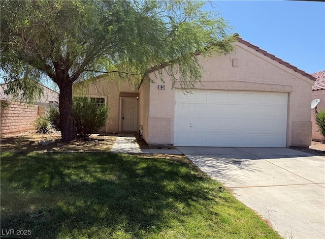 1041 Cedar Pines St, Henderson, NV 89011 - view of front of home with stucco siding, driveway, and an attached garage