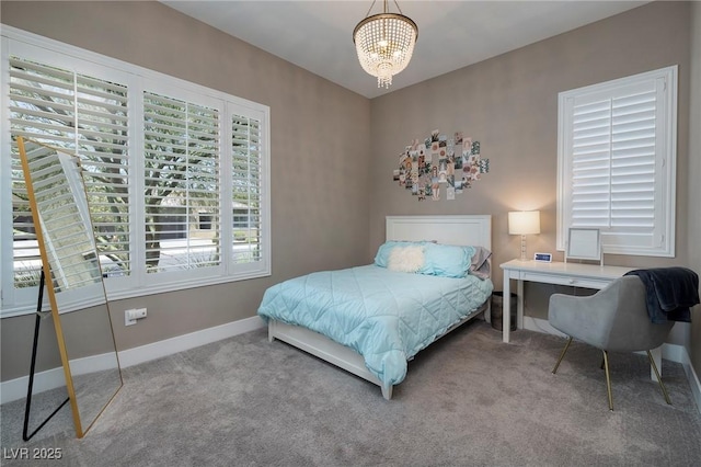 10349 Bressana Dr, Las Vegas, NV 89135 - carpeted bedroom featuring a chandelier and baseboards