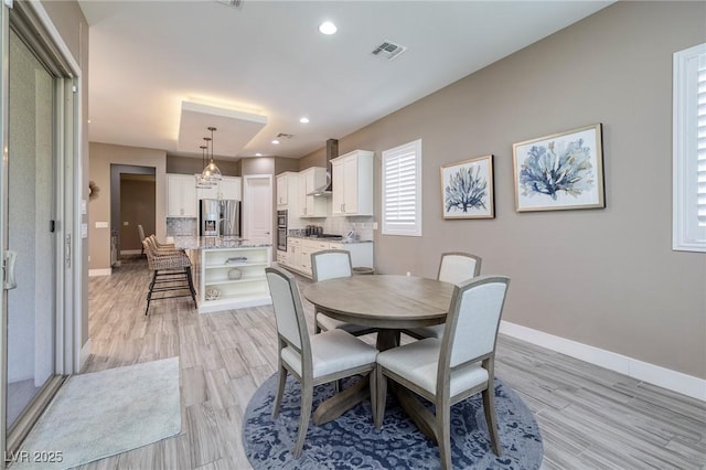 10349 Bressana Dr, Las Vegas, NV 89135 - dining area featuring light wood-style floors and recessed lighting