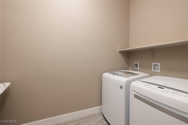 10349 Bressana Dr, Las Vegas, NV 89135 - laundry area featuring washing machine and dryer and baseboards