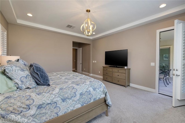 10349 Bressana Dr, Las Vegas, NV 89135 - carpeted bedroom with a tray ceiling, a chandelier, and recessed lighting