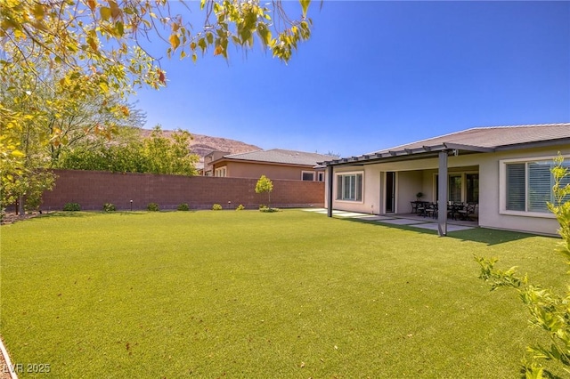 10349 Bressana Dr, Las Vegas, NV 89135 - fenced backyard featuring a patio area