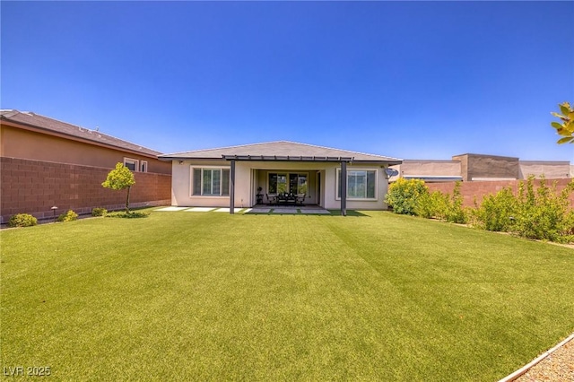 10349 Bressana Dr, Las Vegas, NV 89135 - back of property with a fenced backyard, a patio area, and stucco siding