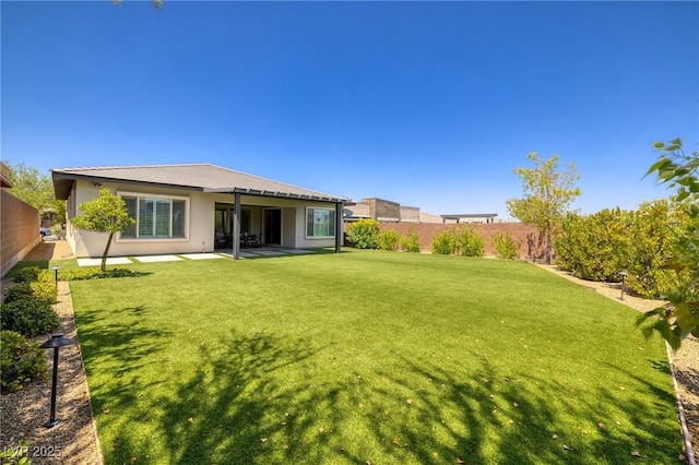 10349 Bressana Dr, Las Vegas, NV 89135 - fenced backyard with a patio